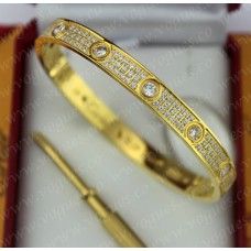 Bracciale Cartier Love in oro giallo con pavé di diamanti
