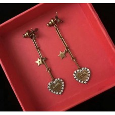 Dior LAmour Avenir Orecchini pendenti lunghi con ciondolo a forma di cuore in cristallo bianco e ape in ottone