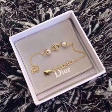Bracciale da donna con logo CD da donna con catena regolabile in oro giallo Dior e perline bianche