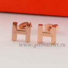 Orecchini Hermes H in oro rosa