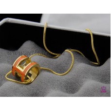 Hermes 3D Pop “H” logo Collana arancione con osso di serpente in oro giallo Hermes 3D Pop “H” logo Collana arancione con osso di serpente in oro giallo