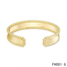 Bracciale aperto di Van Cleef e Arpels in oro giallo Bracciale aperto di Van Cleef e Arpels in oro giallo