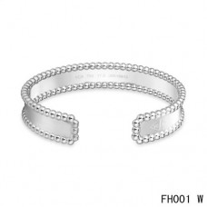 Bracciale aperto di Van Cleef e Arpels in oro bianco Bracciale aperto di Van Cleef e Arpels in oro bianco