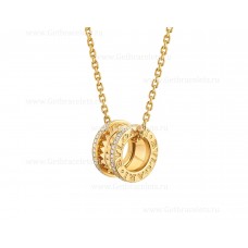 Collana Bvlgari B.zero1 Rock con pendente in oro giallo 18kt con diamanti tempestati di pavé a spirale sui bordi Collana Bvlgari B.zero1 Rock con pendente in oro giallo 18kt con diamanti tempestati di pavé a spirale sui bordi