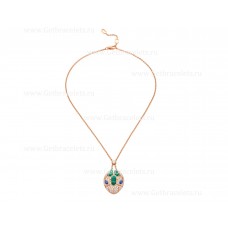 Collana Bvlgari Serpenti in oro rosa 18 carati con occhi in zaffiro blu, elementi in malachite e pavé di diamanti sul pendente