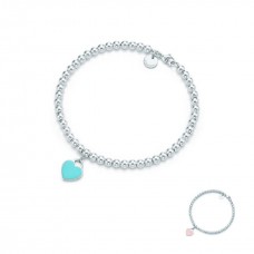 Bracciale Return To Tiffany con perline e ciondolo a forma di cuore rosa da donna Bracciale Return To Tiffany con perline e ciondolo a forma di cuore rosa da donna