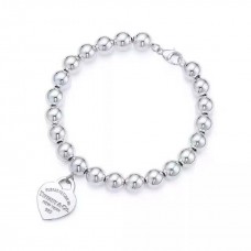 Ritorna al braccialetto con perline Tiffany, pendente a cuore in argento sterling per