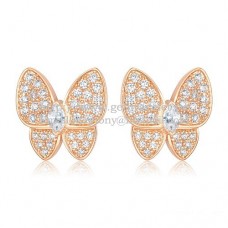 Orecchini Van Cleef Arpels con due farfalle volanti in oro rosa con pavé di diamanti Orecchini Van Cleef Arpels con due farfalle volanti in oro rosa con pavé di diamanti
