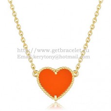Ciondolo a cuore Sweet Alhambra di Van Cleef Arpels in oro giallo con onice rosso e madreperla Ciondolo a cuore Sweet Alhambra di Van Cleef Arpels in oro giallo con onice rosso e madreperla